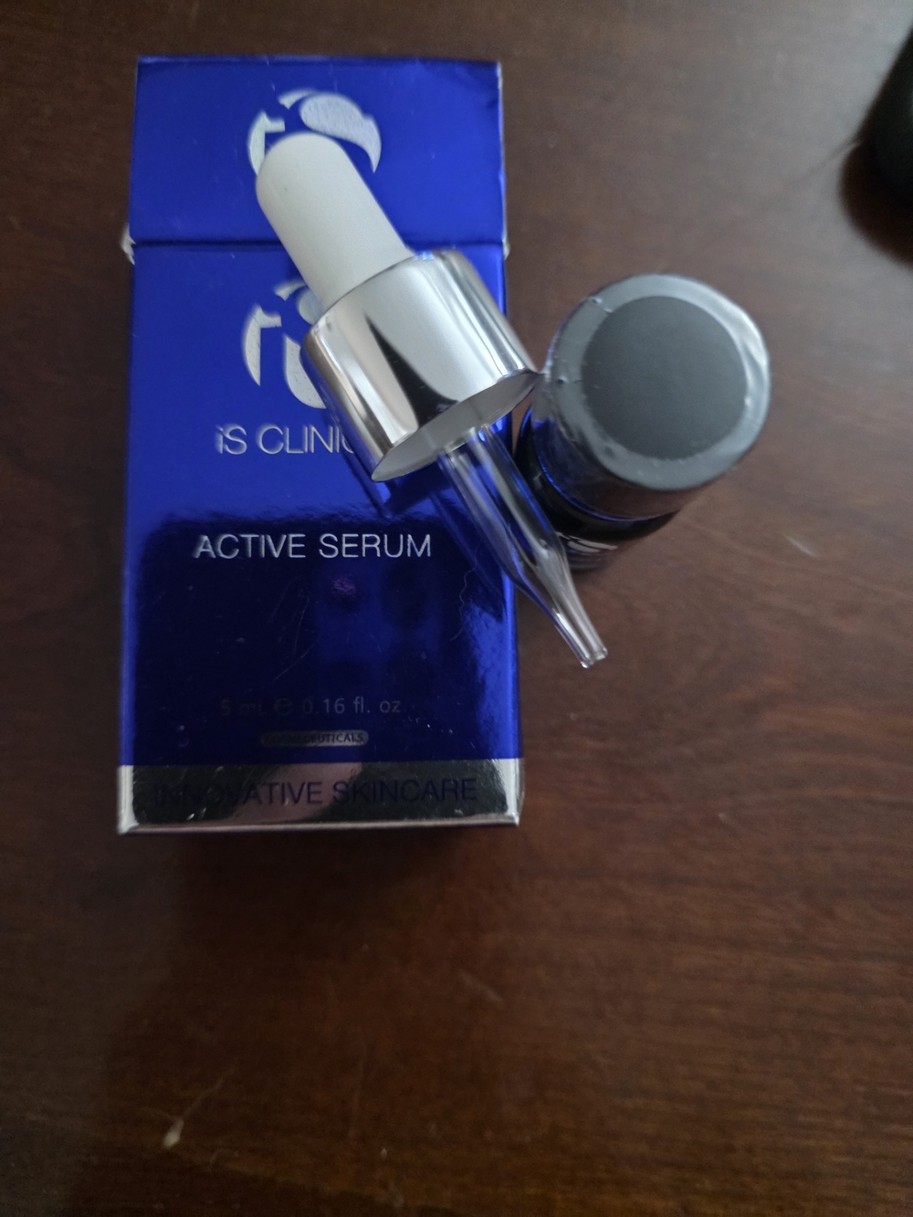 iS CLINICAL Active Serum - Blue Bottle with Silver Dropper